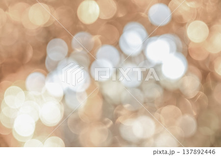 Cool toned bokeh lights with soft blur and scattered highlights forming an abstract lighting pattern that creates a calm winter mood for seasonal design use. Cool toned bokeh lights with soft blur and scattered highlights forming an abstract lighting pattern that creates a calm winter mood for seasonal design use. 137892446