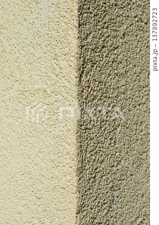 Light and Shadow on Textured Stucco Wall Corner Light and Shadow on Textured Stucco Wall Corner 137892723