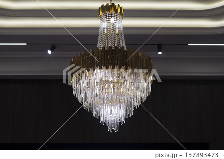 Elegant Crystal Chandelier Lighting in Luxury Interior. 137893473