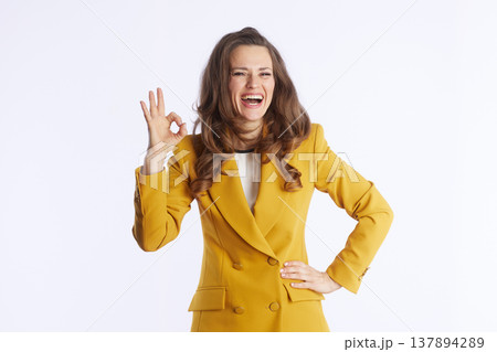 Confident Businesswoman Signals Approval 137894289