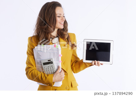 Presenting Businesswoman with Tablet and Documents Presenting Businesswoman with Tablet and Documents 137894290