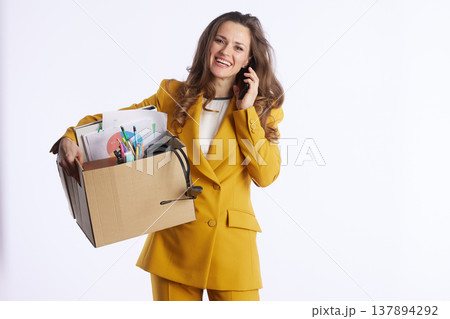 Businesswoman on Phone Amidst Career Change Businesswoman on Phone Amidst Career Change 137894292