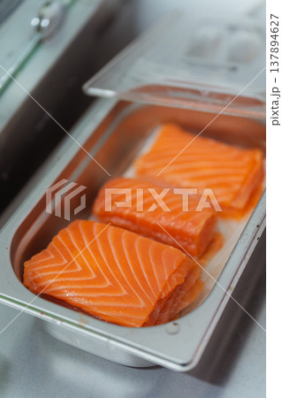 Fresh Salmon Fillets In Metal Tray, Professional Sushi Restaurant Prep, Vibrant Orange Marbling, 137894627