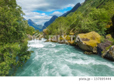 glacial river, waterfall in Briksdalen, Norway glacial river, waterfall in Briksdalen, Norway 137895444