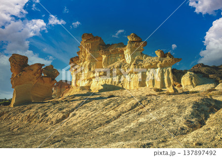 Mushroom rocks in the city of Bolnuevo in Mazarron. Costa Calida, Murcia, Spain. Las Gredas de Bolnuevo Mushroom rocks in the city of Bolnuevo in Mazarron. Costa Calida, Murcia, Spain. Las Gredas de Bolnuevo 137897492