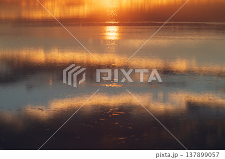 Serene abstract sunset reflection over water in Uyuni Bolivia 137899057