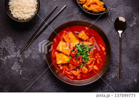 Korean traditional food, spicy kimchi soup (kimchi tige) with pork and tofu cheese. 137899773