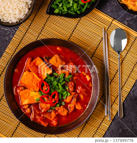 Korean traditional food, spicy kimchi soup (kimchi tige) with pork and tofu cheese. 137899776