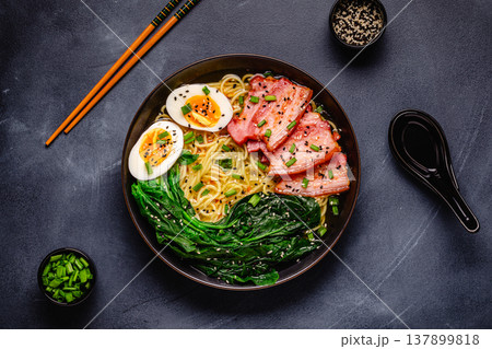 Traditional ramen noodle soup with brisket, spinach and egg. Traditional ramen noodle soup with brisket, spinach and egg. 137899818