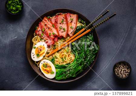 Traditional ramen noodle soup with brisket, spinach and egg. Traditional ramen noodle soup with brisket, spinach and egg. 137899821