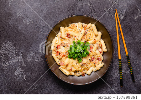 Spicy Rice Cake with Cheese and Bacon or Cream Teokbokki, Tteokbokki. Spicy Rice Cake with Cheese and Bacon or Cream Teokbokki, Tteokbokki. 137899861