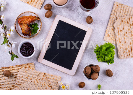 Traditional Passover Seder plate with symbolic foods. Symbolic of Jewish holiday Pesah. Traditional Passover Seder plate with symbolic foods. Symbolic of Jewish holiday Pesah. 137900523