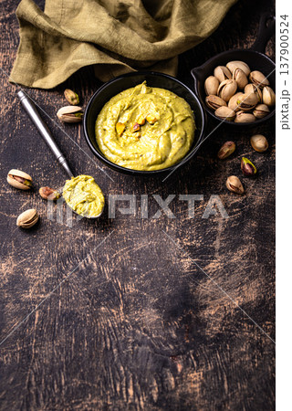 Sweet pistachio cream in a bowl 137900524