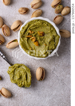 Sweet pistachio cream in a bowl Sweet pistachio cream in a bowl 137900554