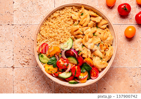 Bowl of quinoa with vegan soy meat and vegetables. Bowl of quinoa with vegan soy meat and vegetables. 137900742