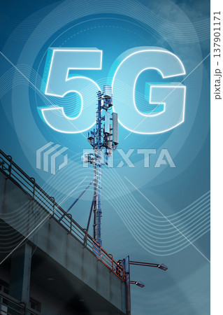 5G internet tower stands on building under blue sky with waves surrounding it 5G internet tower stands on building under blue sky with waves surrounding it 137901171