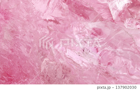amethyst crystal displays frozen textures with cool Pink hues. The icy surface of the gemstone amethyst crystal displays frozen textures with cool Pink hues. The icy surface of the gemstone 137902030