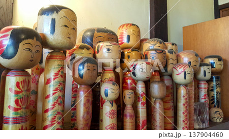 Photo of a collection of vintage kokeshi dolls in a traditional Japanese home Photo of a collection of vintage kokeshi dolls in a traditional Japanese home 137904460