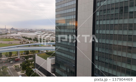 The view of Tokyo from a building window, showing dense urban skyline, rooftops, streets and distant skyscrapers The view of Tokyo from a building window, showing dense urban skyline, rooftops, streets and distant skyscrapers 137904469