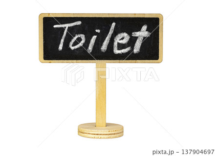 Charming Rustic Wooden Pedestal Stand Blackboard Sign with White Chalk Handwritten Toilet Text Isolated on Clean White Background with Copy Space for Design Use 137904697