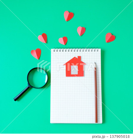 Minimal red house with blank book note and pencil . Minimal red house with blank book note and pencil . 137905018