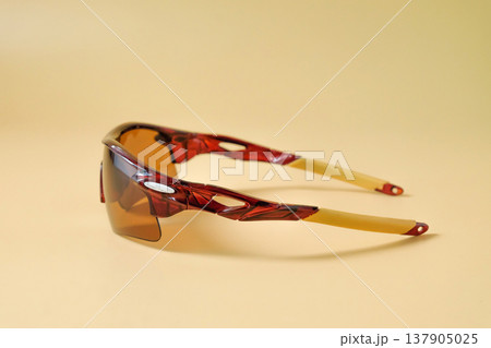 Fashion suneyeglasses on color background. 137905025