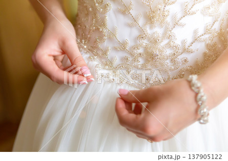 beautiful wedding dress close-up details of wedding lace 137905122