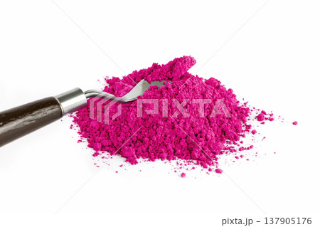 Bright Magenta Powder With Gardening Tool on White Background Showcasing Vibrant Color 137905176