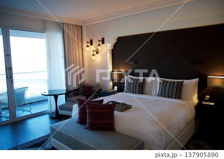 Fujairah, United Arab Emirates, November 04 2017: King Size Bed in Luxury Hotel Room with Sea View 137905890