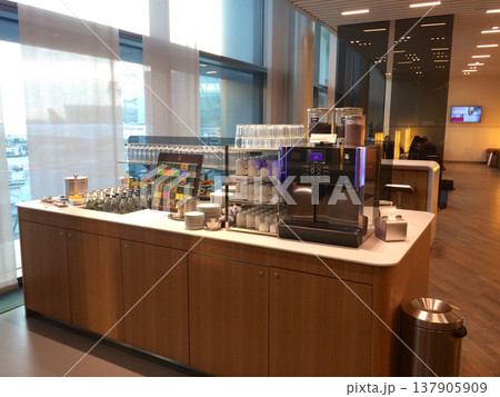 Frankfurt, Germany, 02 September 2017: Small buffet with coffee machine and tea selection in a frequent flyer lounge 137905909