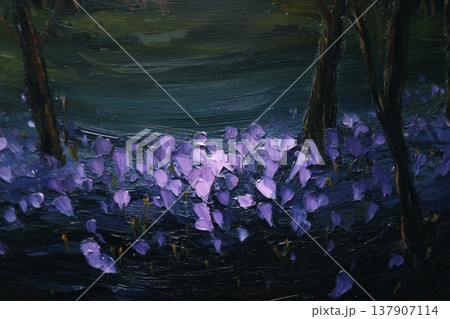 Purple flowers blooming in dark forest with trees and soft light illuminating 137907114