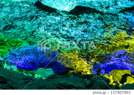 View inside the ancient cave with stone walls with additional lighting 137907993