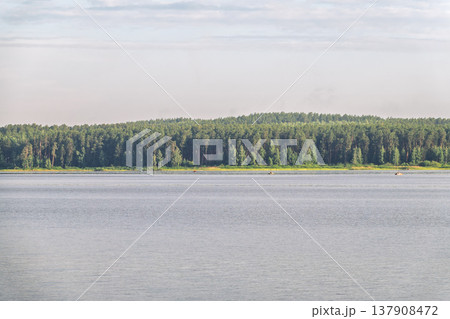 Blue lake with cloudy sky, natural background 137908472