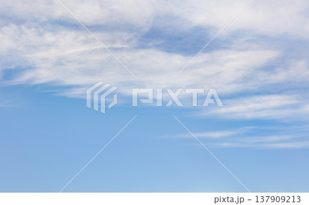Sky background, lower part is clear blue, upper with cirrus clouds Sky background, lower part is clear blue, upper with cirrus clouds 137909213