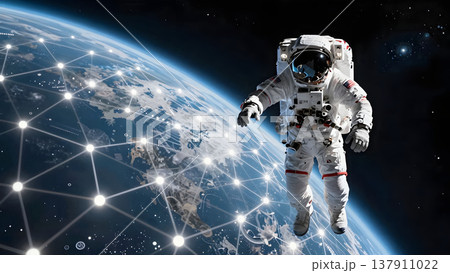 地球とテクノロジーがつながる未来を象徴する宇宙飛行士の浮遊シーン 137911022