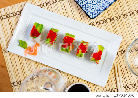 Uramaki with tobico topping Uramaki with tobico topping 137914976