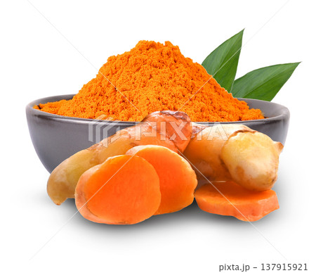 Turmeric powder in bowl with turmeric sticks on white background. Turmeric powder in bowl with turmeric sticks on white background. 137915921