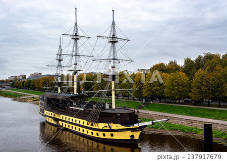 Three-masted schooner off the coast. 137917679