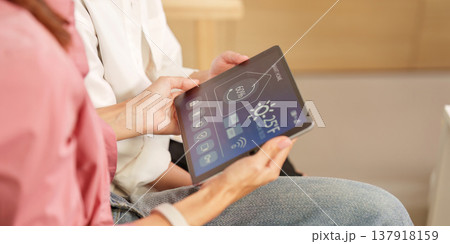 Smart home tablet interface in use Smart home tablet interface in use 137918159