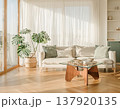 明るいナチュラルリビング 白いソファとモンステラ  ガラステーブル 北欧風インテリアのおしゃれな部屋 137920135