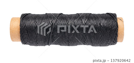spool of colored thread on a white isolated background 137920642