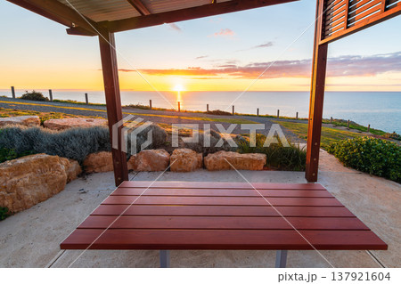 Sunset view from picnic shelter over coastal trail, Hallett Cove, South Australia 137921604