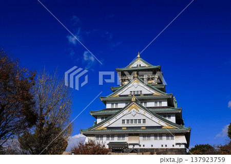 Main Tower of Osaka castle with autumn blue sky white cloud, frame one of Japan's best destinations for travel, Osaka Japan. Main Tower of Osaka castle with autumn blue sky white cloud, frame one of Japan's best destinations for travel, Osaka Japan. 137923759
