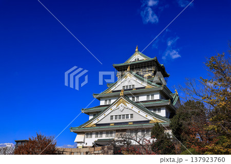Main Tower of Osaka castle with autumn blue sky white cloud, frame one of Japan's best destinations for travel, Osaka Japan. Main Tower of Osaka castle with autumn blue sky white cloud, frame one of Japan's best destinations for travel, Osaka Japan. 137923760