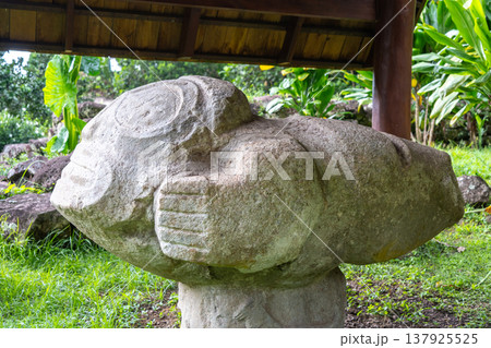 Stone sculpture of a birthing woman at Te Lipona, Hiva Oa, French Polynesia Stone sculpture of a birthing woman at Te Lipona, Hiva Oa, French Polynesia 137925525