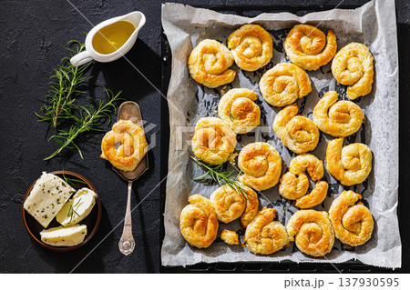Greek cheese sarikopita spiral pies, top view Greek cheese sarikopita spiral pies, top view 137930595