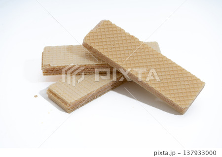 Stacked vanilla wafers dessert snack food on white Stacked vanilla wafers dessert snack food on white 137933000