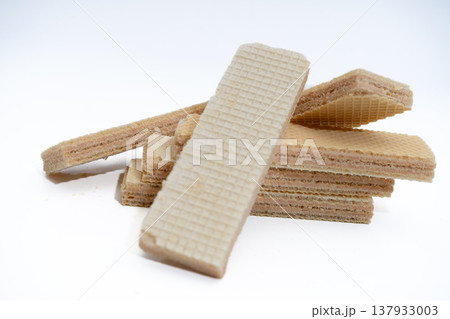 Layered sweet wafers creating delicious dessert snack Layered sweet wafers creating delicious dessert snack 137933003