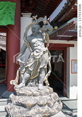 Statue of guardian figure at Buddha Tooth Relic Temple in Chinatown Singapore showcasing detailed architecture and vibrant culture Statue of guardian figure at Buddha Tooth Relic Temple in Chinatown Singapore showcasing detailed architecture and vibrant culture 137933086