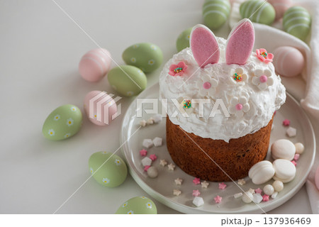 Easter Cake with Bunny Ears and Easter Eggs. Festive Spring Composition 137936469